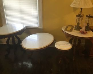oval period marble top tables and  small chair side round table 50's    Bradley Hubbard mirrored candle sconce on table with art glass vase