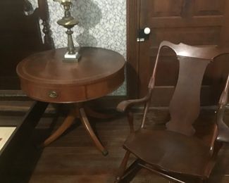 Lawyers drum table with tripod pedestal base  Solid rocking chair 