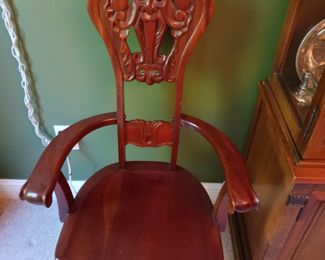 Carved chair with the North Wind