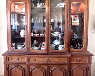 Large china cabinet with storage cabinets 