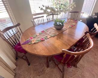Beautiful wood dining set with 6 chairs (table ends fold down) 