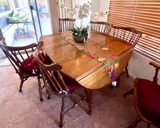 Beautiful wood dining set with 6 chairs (table ends fold up and down) 