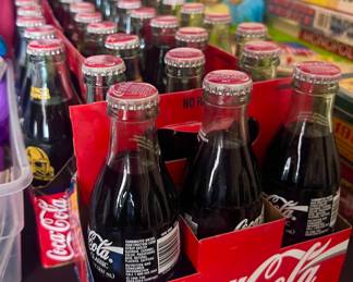 Vintage Coca Cola bottles unopened 