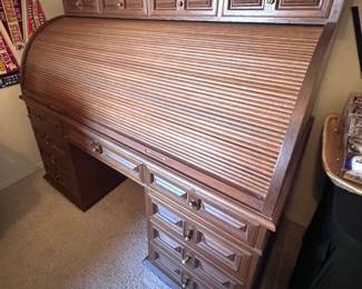 Large office desk with organizational drawers and pull down cover 