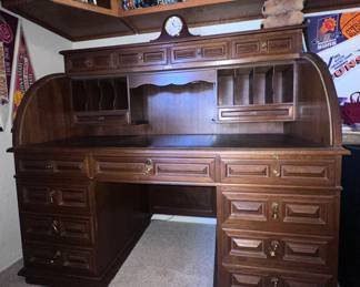 Large office desk with organizational drawers and pull down cover