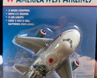 American West Airlines light up pull n go airplane toy