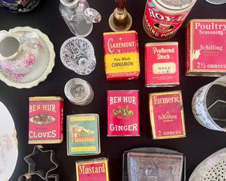 Vintage and antique tins and cookie cutters and kitchen utensils.