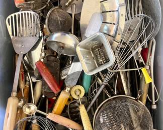 Lots and lots of vintage and antique kitchen cookie cutters and gadgets.