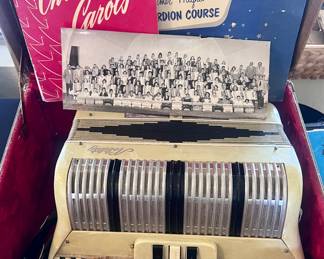 Vintage accordion and accordion music and books