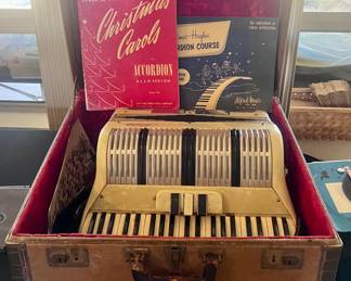 Vintage accordion and accordion music and books. All kinds of piano sheet music too.