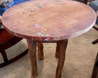 Handcrafted rustic side table with hand-painted southwestern art.