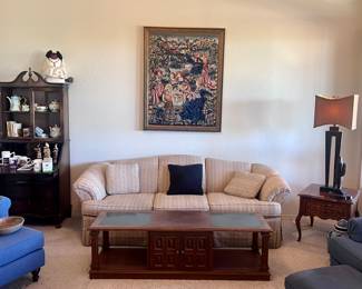 Beige sofa, side tables, mid-century modern lamps, coffee table, Governor Winthrop secretary desk, Thomasville chairs, Laz-y-boy chairs, gorgeous Needlepoint art