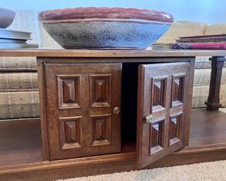 Coffee table with storage cabinets