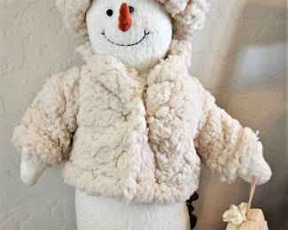 Vintage snowman with gift