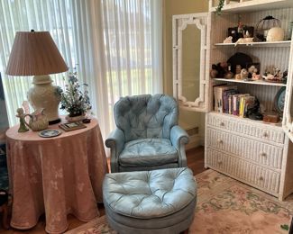 Pale blue leather chair and ottoman