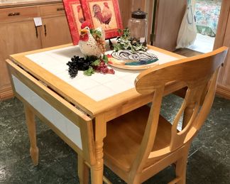 White tile top table for two (of 4 with leaves up - but 2 chairs available)