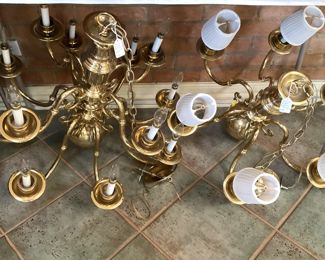 Two large brass chandeliers