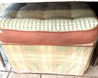 One of two custom upholstered stools