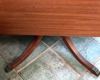 Ribbed and brass-tipped detailing on the legs