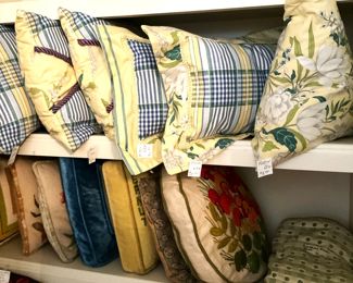 Decorative pillows including needlepoint