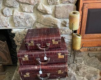 Alligator leather suitcases