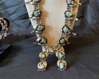 Coin, silver squash blossom