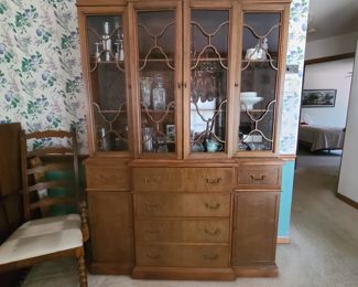 Curio or China cabinet .  Beautiful piece with shape to the unit.  $100