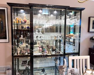 Beautiful black lacquered curio cabinet w/all glass doors, sides and shelves - the back of cabinet and bottom shelves are mirrored