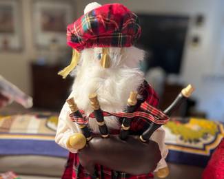 Scottish Santa bag pipe player 