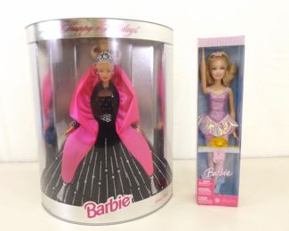1998 Never Removed From Box Holiday Barbie and a 2002 Barbie	
