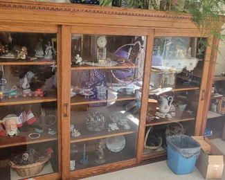 Antique display with sliding doors