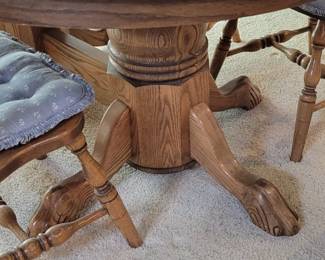 Dining table with claw feet
