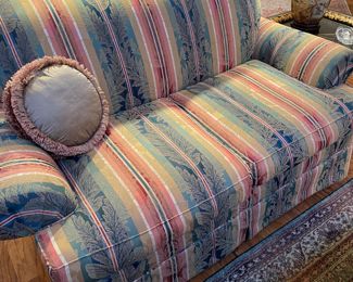Brocade upholstered loveseat 