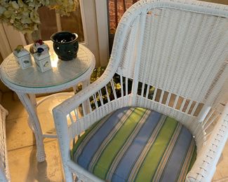 White wicker rocker and table