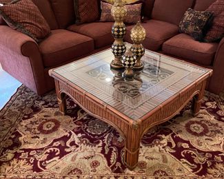 L shaped sofa and rattan glass top coffee table 