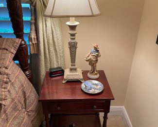 One of a pair of mahogany nightstands 