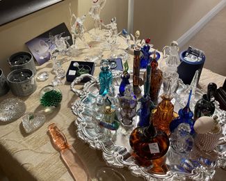 Collection of Swarovski Crystal figurines and perfume bottle collection 