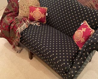 Wonderful black with gold star camel back sofa