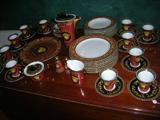 VERSACE MEDUSA RED ROSENTHAL 55 PCS $2,800.00
13 CUPS
13 SAUCERS 
1 CREAMER
1 SUGAR
1 COFFEE POT
8 DINNER PLATES 
8 SOUP
8 SALAD PLATES
1 CHARGER