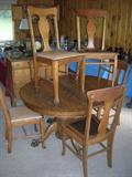 ROUND OAK TABLE  CLAW FEET WITH FOUR CHAIRS