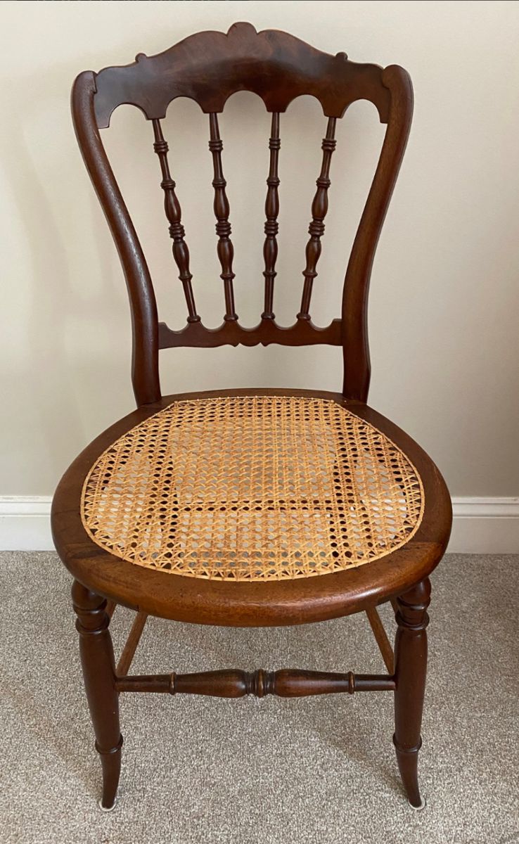 Exquisite antique wood and cane chair