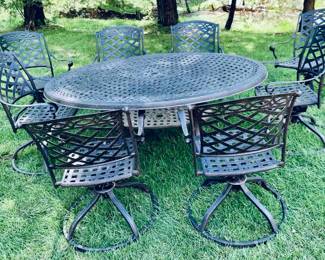 Gorgeous wrought iron patio set with 8 arm chairs!
