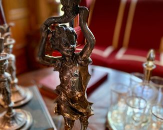 $350.00 Patinated metal figure holding cut glass bowl 22"h x 14" w 