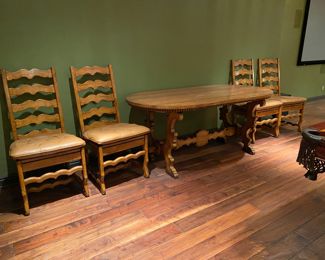 $1,600 French country dining table and 4 ladder back chairs with leather cushions