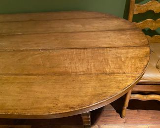 $1,600 French country dining table and 4 ladder back chairs with leather cushions                                                        Table: 31”h x 72” long x 36”w