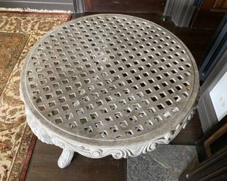 $250.00 Cast aluminum side table 25"h x 30" diameter 