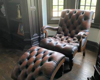  Tufted leather lounge chair & ottoman                               Chair: 33"h x 30.25"w x 35"d  ottoman: 13"h x 24"d