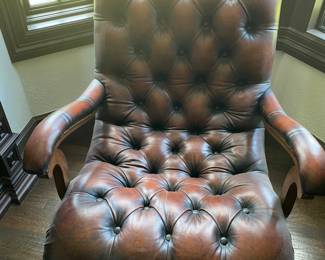  Tufted leather lounge chair & ottoman                               Chair: 33"h x 30.25"w x 35"d  ottoman: 13"h x 24"d