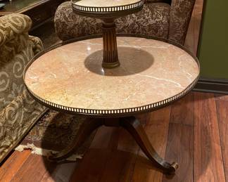 $450.00 Two tier marble-top table 34"h x 30" diameter 