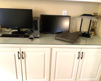 various display monitors, desk lamps, modem